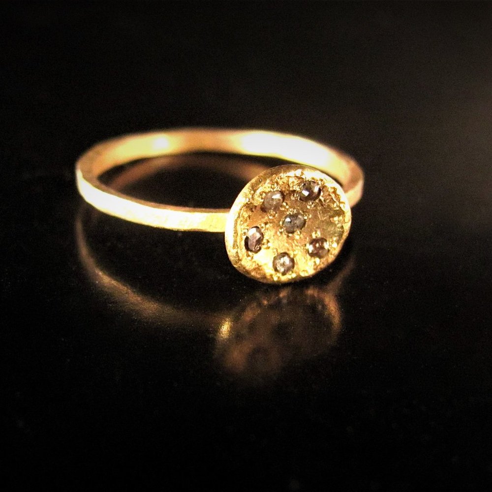 Gold diamonds ring.